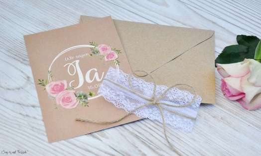 Hochzeitseinladung floral Vintage Spitze weiß Kraftpapier Blumen diy